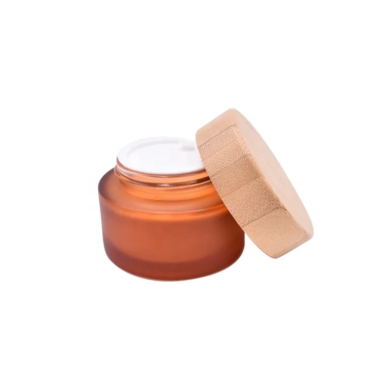 

Empty Cosmetic Gel Scrub Butter Cream Jar 30g 50g Custom Amber Frosted Glass Container with Bamboo lid for Lotions Lip Balm