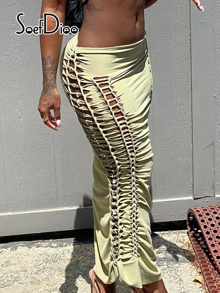 

Soefdioo Solid Ruched Hollow Out Bandage Slim Skirts Women Fashion Streetwear Summer 2022 Sexy Clubwear Maxi Skirt