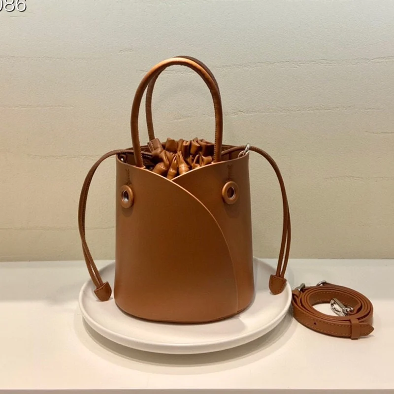 

Versatile, niche design, genuine leather, handbag, large capacity, flower bag, fashion, multifunctional shoulder, messenger bag,
