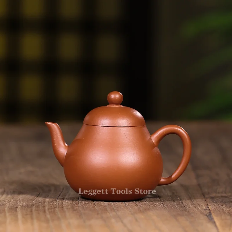 

Китайский чайник из исинской фиолетовой глины, чайник из сырой Руды Zhuni, чайник в форме груши, чайный набор кунг-фу, чайник небольшой емкости ...