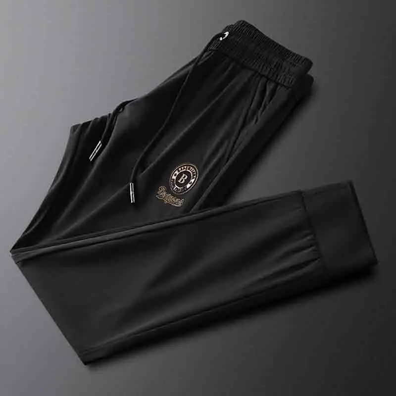 

2022 summer thin black sports pants men's slim soft and breathable men's simple and good fit elastic waist pants handsome