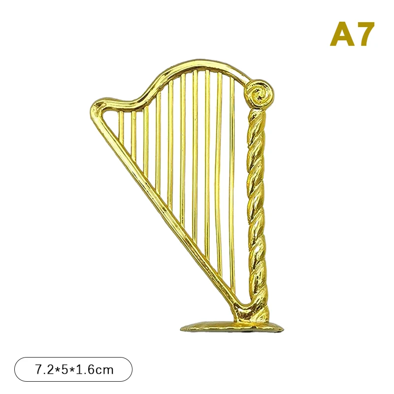 

Мини пластиковый музыкальный инструмент золотого цвета