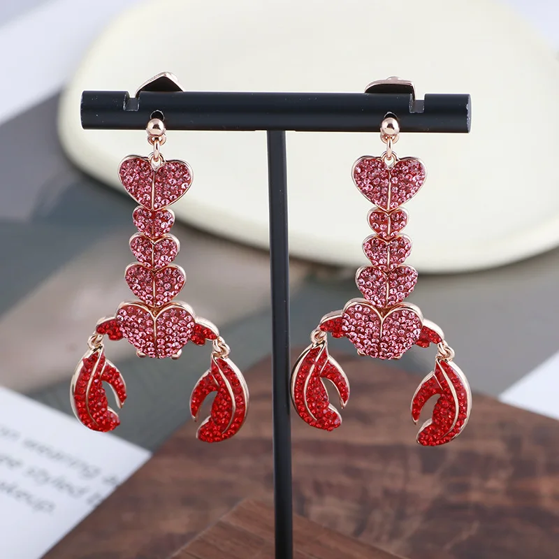 

Серьги в форме лобстера с красным сверканием