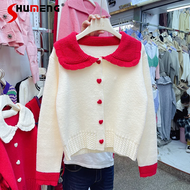 

Женский трикотажный свитер, кардиган контрастных цветов в Корейском стиле с кукольным воротником и пряжкой в виде сердечек, новинка 2022