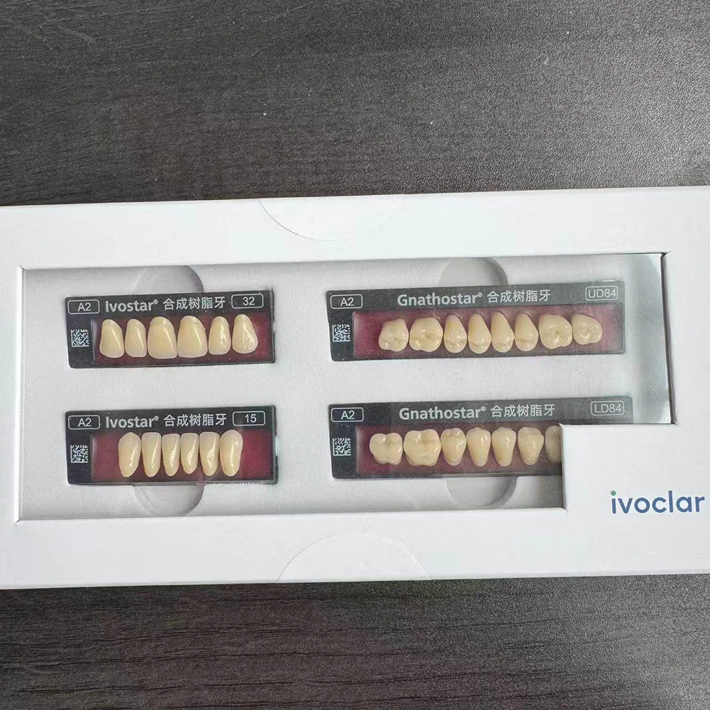 Фото Полный комплект зубных протезов из акриловой смолы Original Ivoclar Vivadent Ivostar + Gnathostar: набор передних и задних композитных искусственных зубов №5