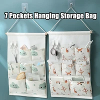 7 pockets cotton wall mounted storage bag punch free behind door storage pocket home sundries clothes hanging bag toys organizer