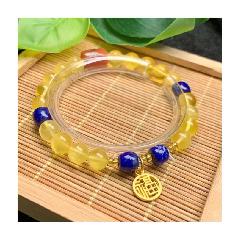 Браслет из натурального янтарного пчелиного воска с бусинами лазурита и