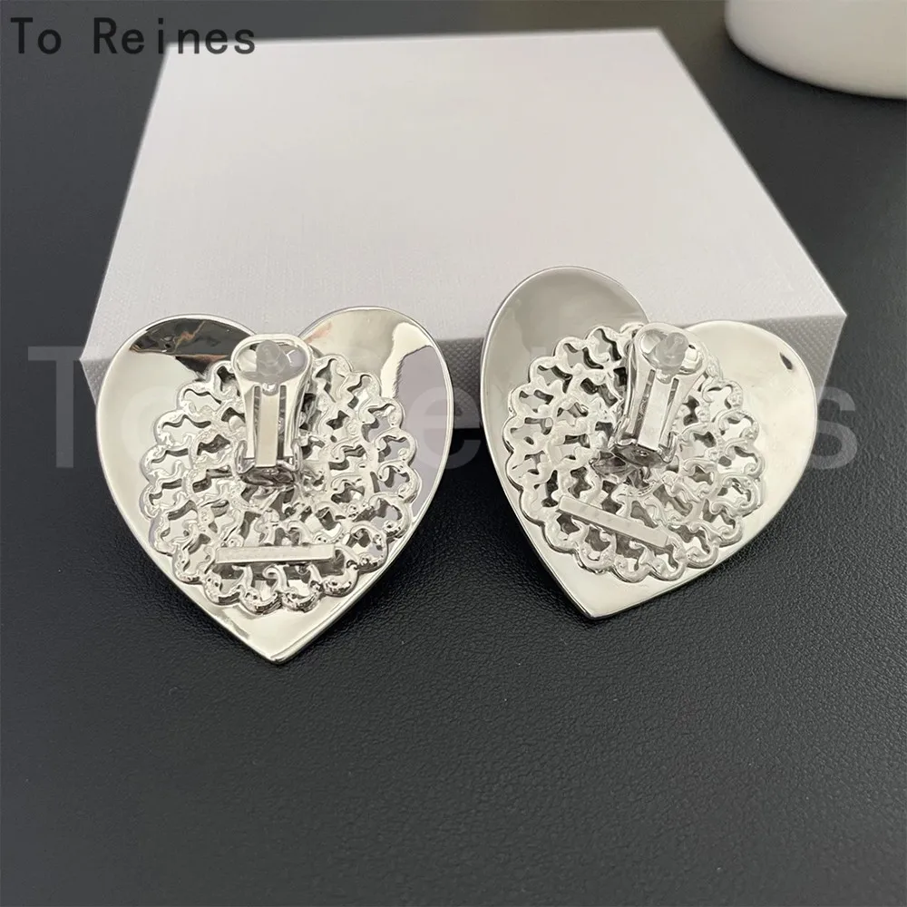 Женские серьги-клипсы в форме сердца с кристаллами