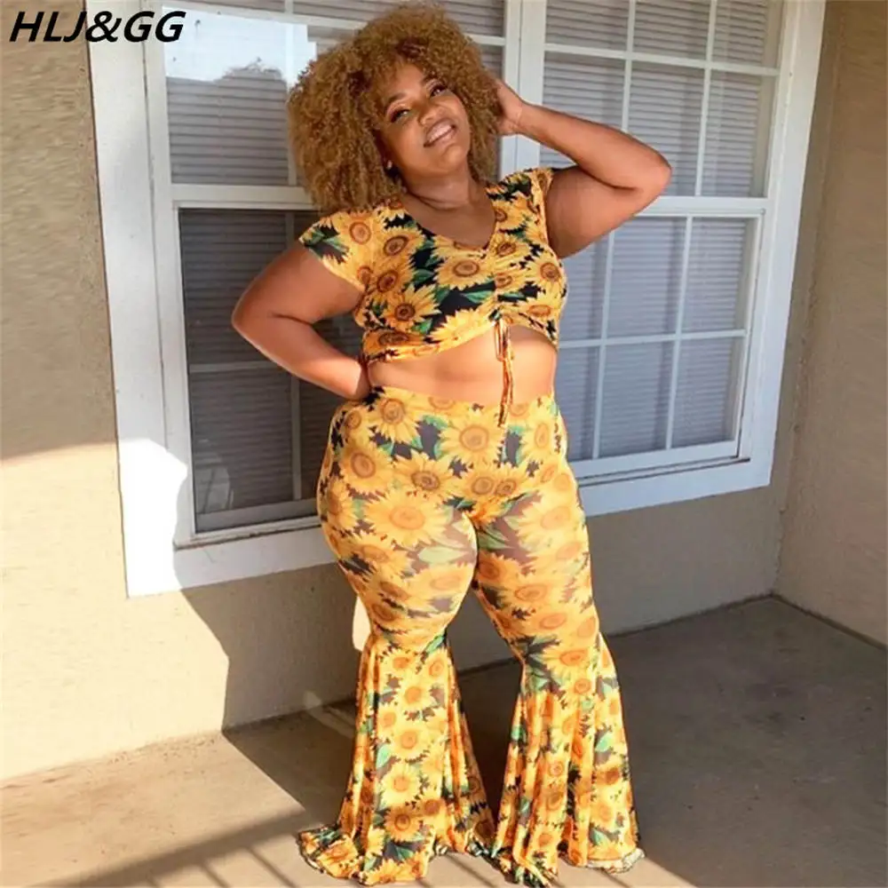 

HLJ&GG Sunflower Print Plus Size Two Piece Sets Womwen Short Sleeve V Neck Drawstring Tops And Flare Pant Tracksuits L-4XL 2022