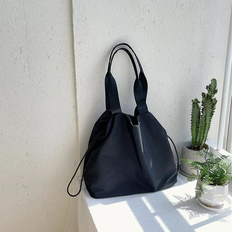 

woman's [UNK]Nilon[UNK] handbag, tote Bag s. great capacity Double the rope Calls Multifunctional personality