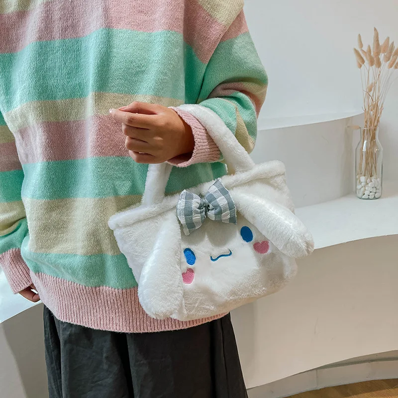 

2022 new Japanese hand-held plush toy shoulder bag girl satchel large capacity makeup handbag holiday gift