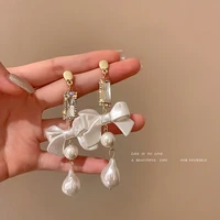 sheshine silver needle korean style pearl diamond bow party earrings sweet fashion stud earbob design net red trendy ear jewelry