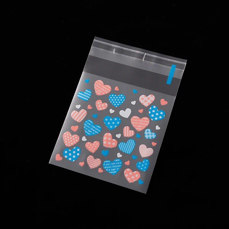 

Прозрачные пакеты для конфет в форме сердца 100 шт.