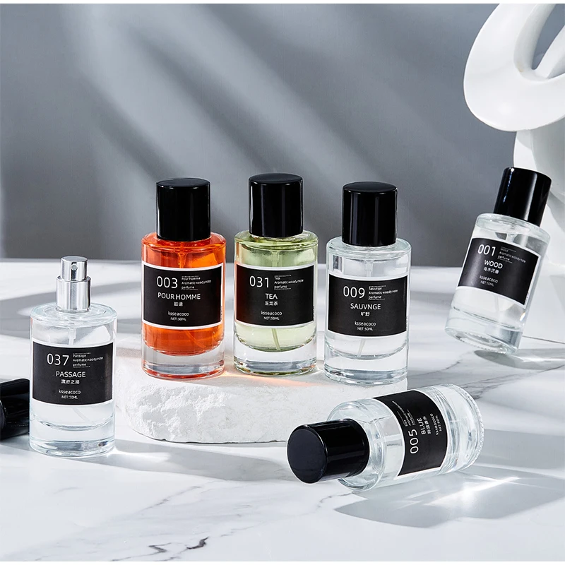 Фото Брендовые духи Стойкий аромат Новый свежий легкий аромат Tk Лидер продаж Элегантный аромат Вуди 50 мл Мужские и женские духи №1