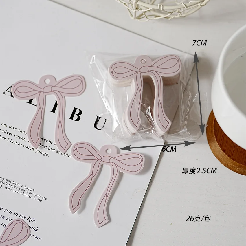 

50 шт. розовые бумажные этикетки с бантом