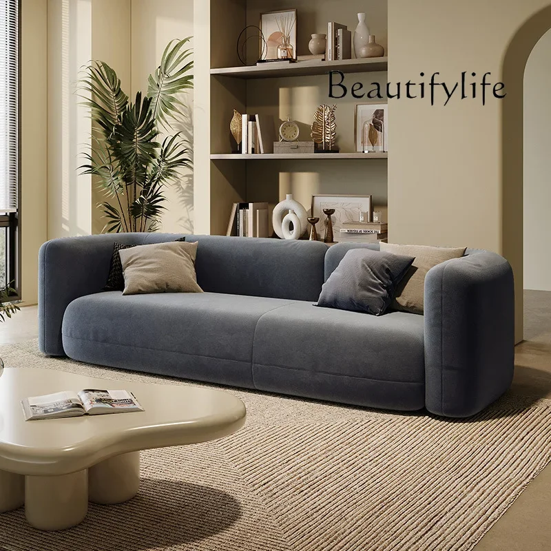 Магазин одежды квартира гостиная темно-зеленый тканевый диван современный