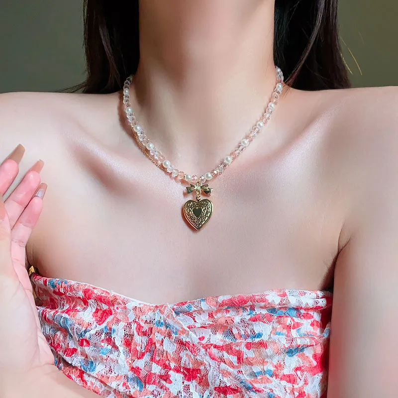 Crystal Pearl Bow Necklace for women French Romantic Love Pendant Clavicle Chain Wholesale fashion and sweet temperament jewelry