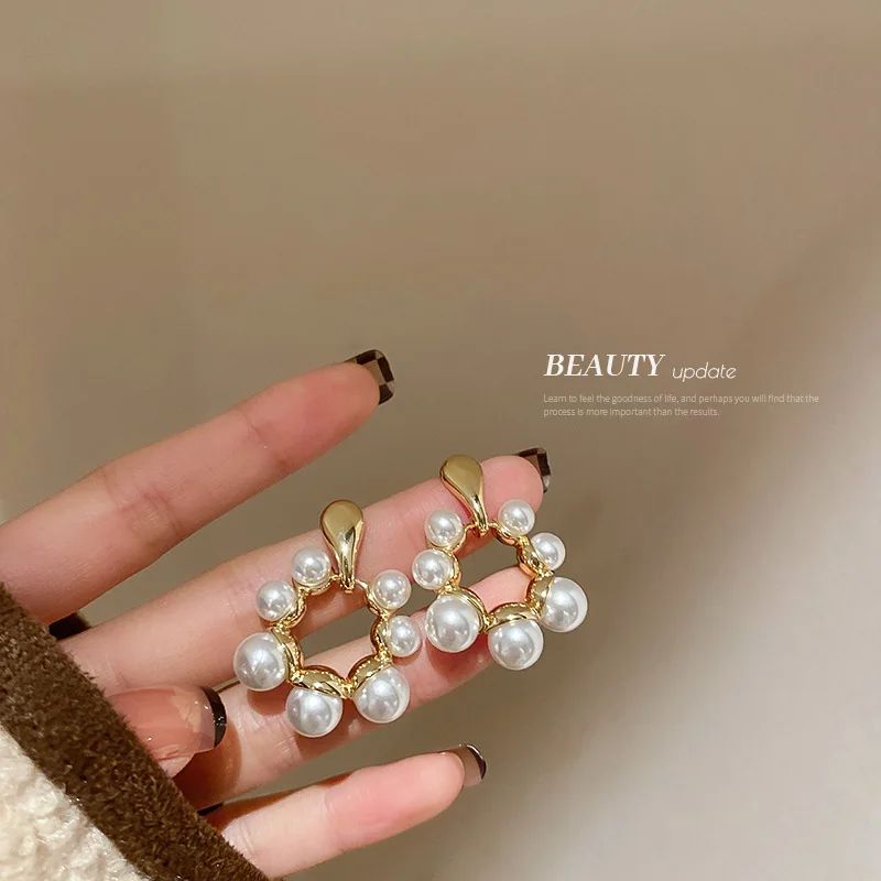 

Real Gold Plating 925 Silver Needle Irregular Circle Pearl Earrings Small Crowd Garland Design Sense Temperament