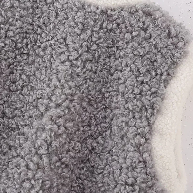 Женский зимний теплый жилет из овечьей шерсти