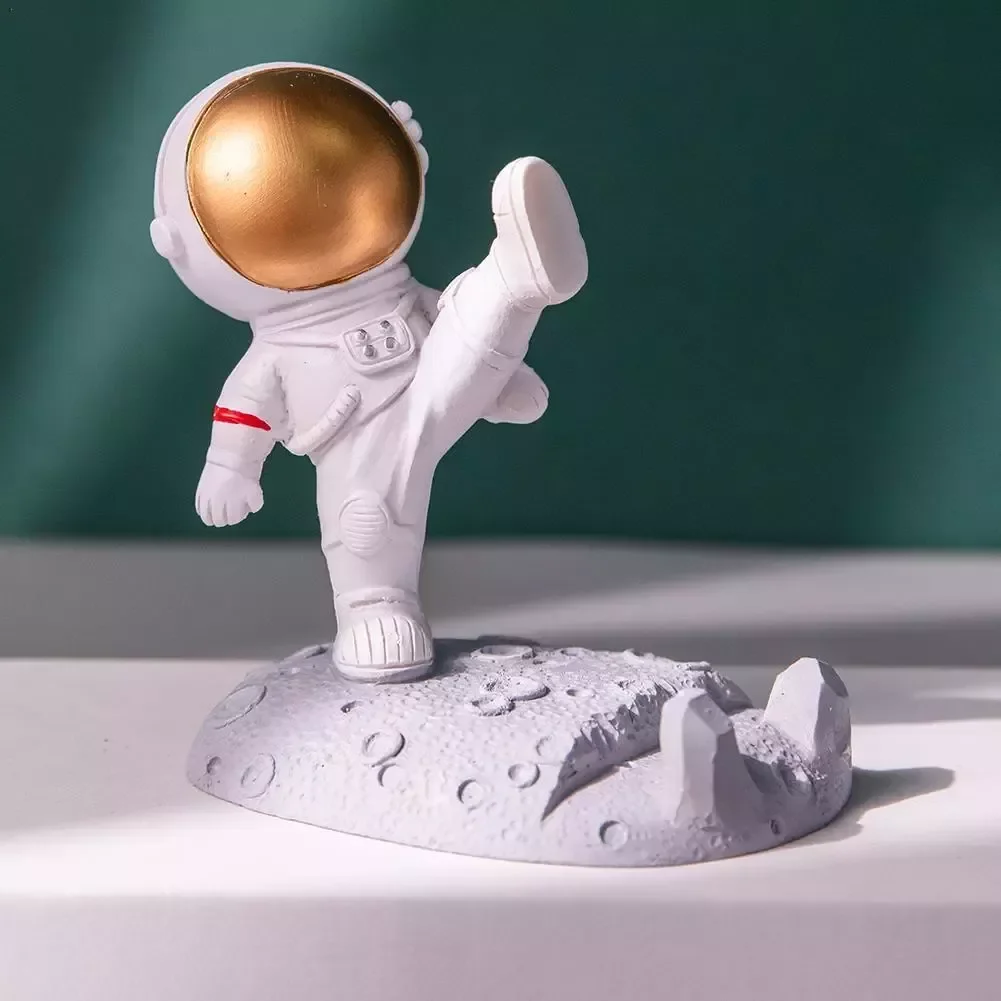 

Free Shipping Resin Astronauts Ornaments Cell Mobile Stand Holder Spaceman Bracket Toys Home Office Desk Decor B