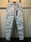 Джинсы мужские рваные кожаные со звездами в стиле хип-хоп