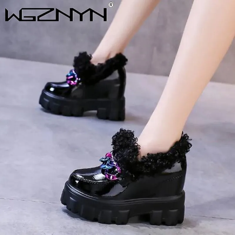 

Женские зимние кожаные кроссовки на массивной платформе и высоком каблуке