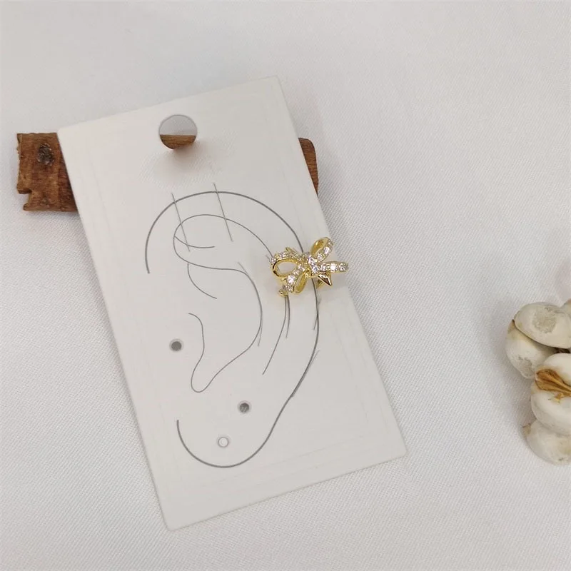 

High-grade pearl bow ear cuff metal delicate ear jewelry trendy women