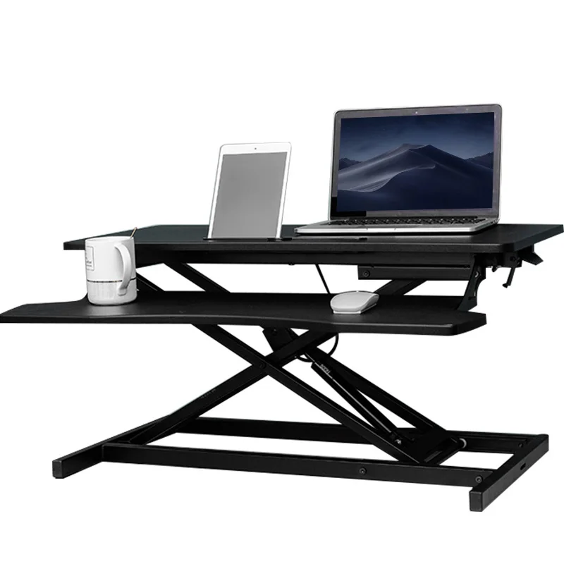 

Adjustable sit stand desk converter on desktop