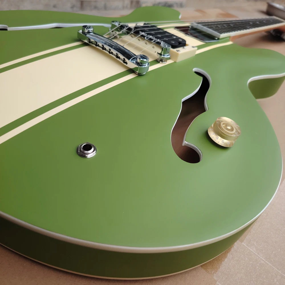 Флюоресцентная электрическая гитара с коричневыми круглыми краями и