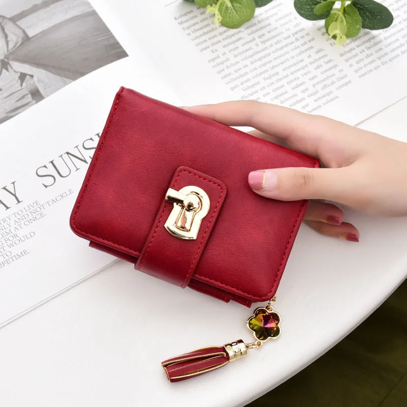 Wallet women's short 2022 new Korean fashion tassel wallet buckle zipper multi card folding zero wallet women
