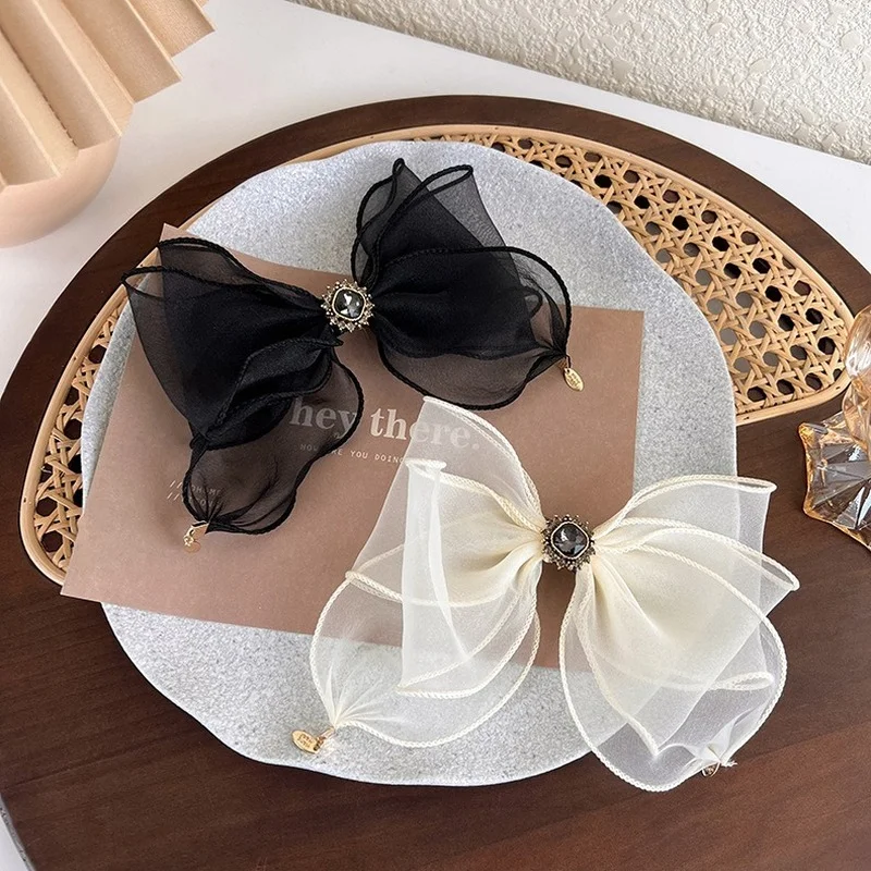 

Temperament mesh bow with diamond hairpin headgear elegant clip headgear at the back of the head Korean fairy spring clip