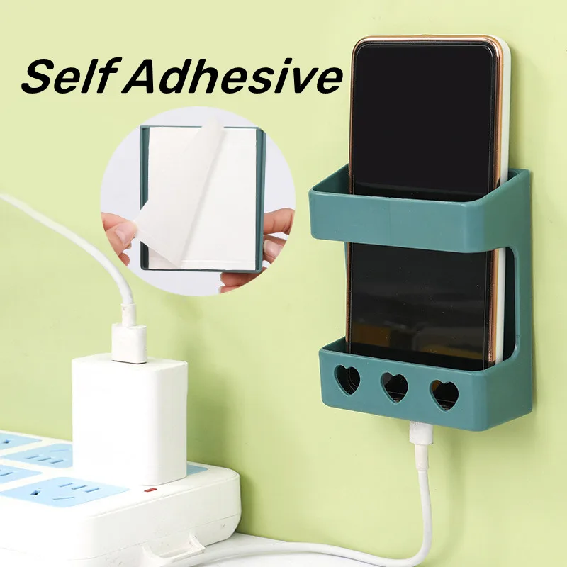 

Self Adhesive Phone Charging Holder Useful Remote Control Hanging Organizer Portable Plug Cable Holder Storage Box Home Gadgets