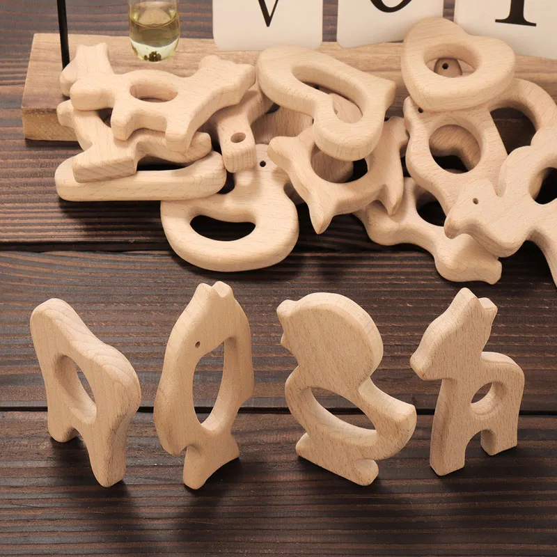 

TYRY.HU 10Pcs Animal Shaped Beech Wooden Teether Natural Healthy Material Baby Teething Toys Creative Pendant For Jewelry Making