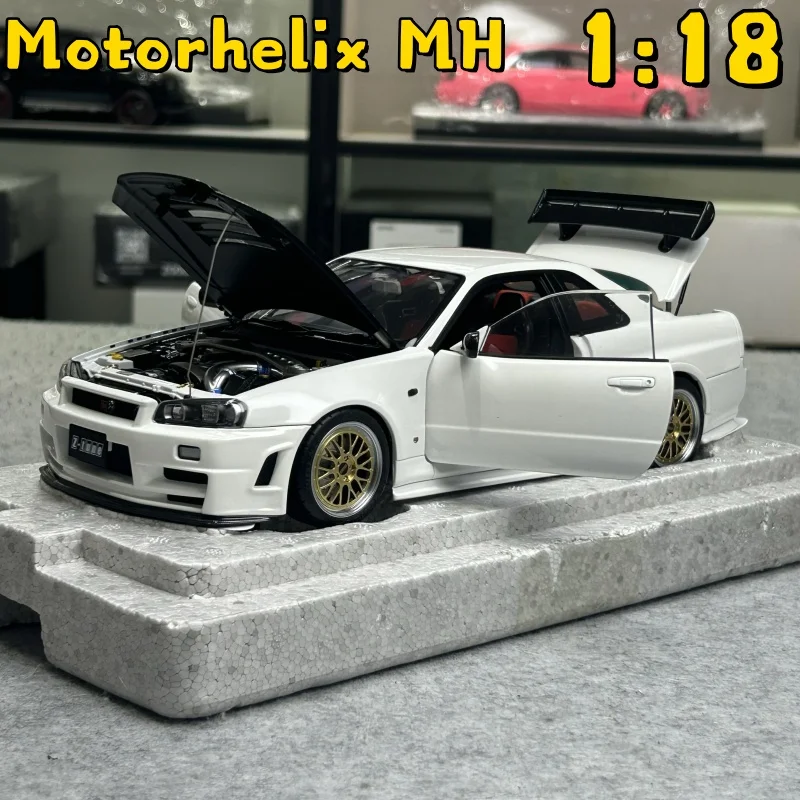 Фото MH 1:18 GTR R34 Z-tune nismo White Exhibition Limited Edition, полноразмерная литая модель автомобиля из сплава, украшения для взрослых №1