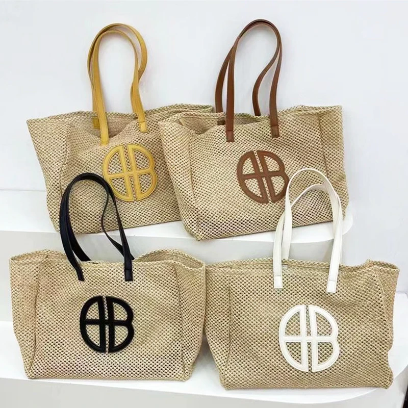 

2023 Summer Designer Knitting Handbag Straw Beach Storage Bag High Capacity Travel Shoulders Bag Handwork Hollow Out Brand Purse