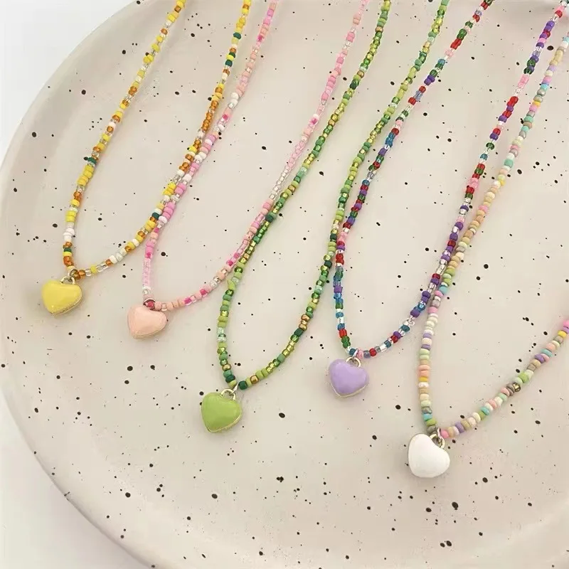 

2023 New Candy Color Love Beaded Pendant Necklace For Women Sweet and Cute Girls Clavicle Chain Jewelry Wholesale Direct Sales