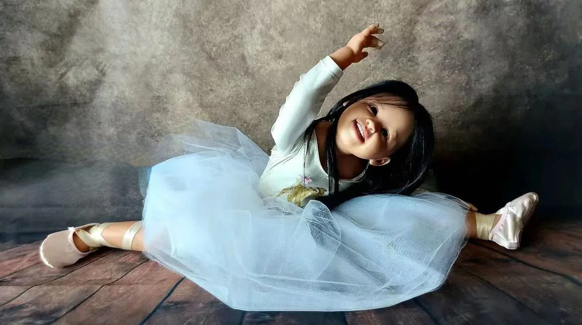 Рисунок 4 - Кукла реборн с длинными черными волосами