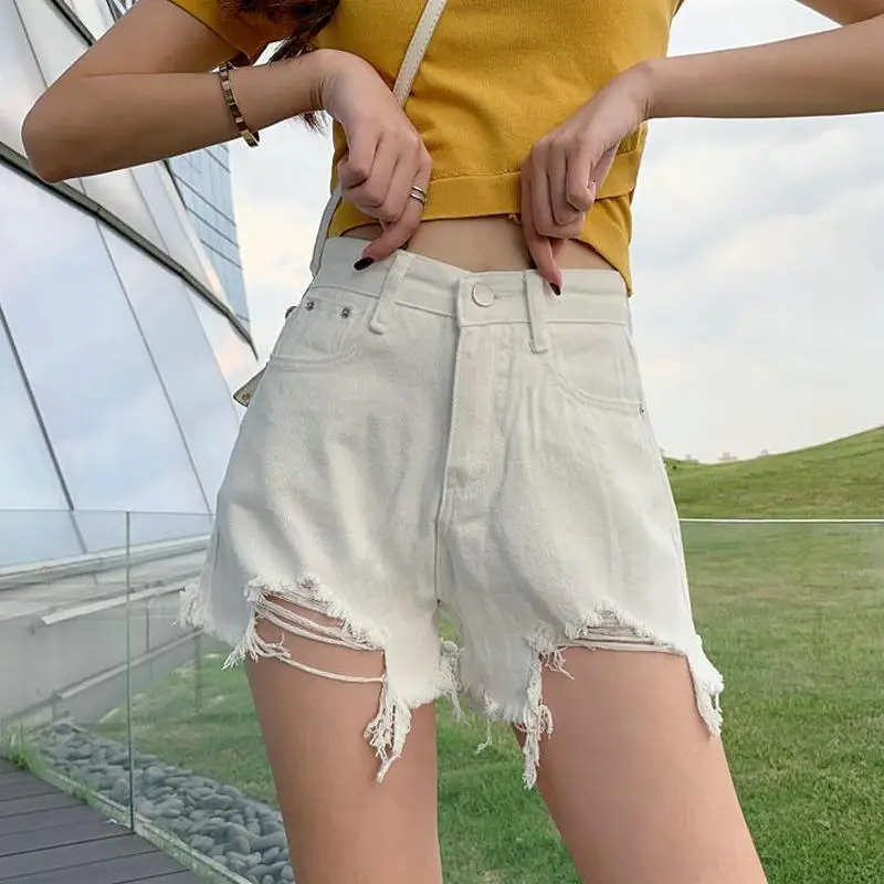 High-waisted Denim Shorts Women Summer 2022 New Solid Cec Loose Holes Show Thin Students A-word Raw edge Wide-leg Hot Pants Tide