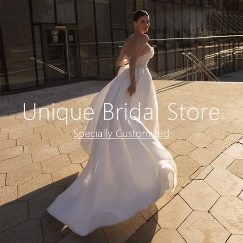 Wedding Dresses Sleeveless Strapless Backless A-line Ruffle Organza Exquisite Sweep Train for Women 2023 White Bridal Gown