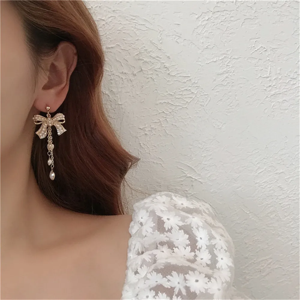 

S925 Silver Needle Bow Earrings Pearl Advanced Earrings 2022 New Tide Earrings Earrless Women