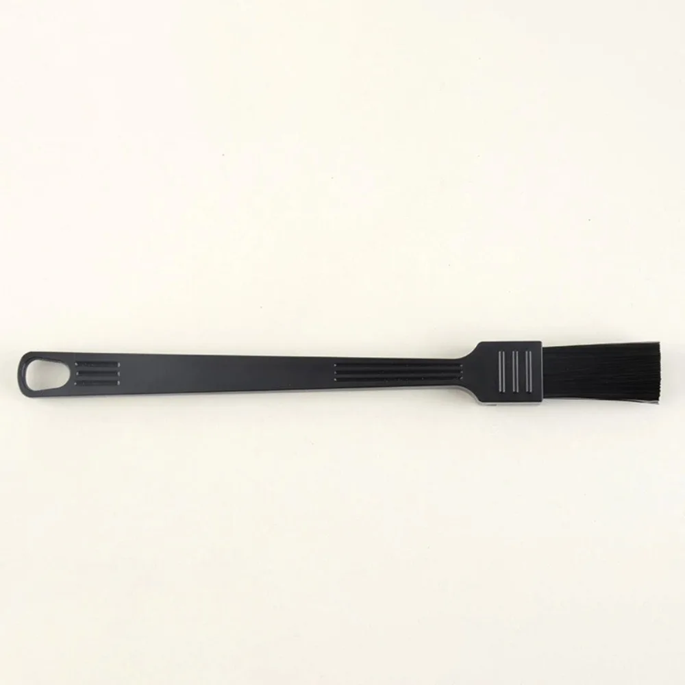 

Пластиковая щетка для чистки кофемолки