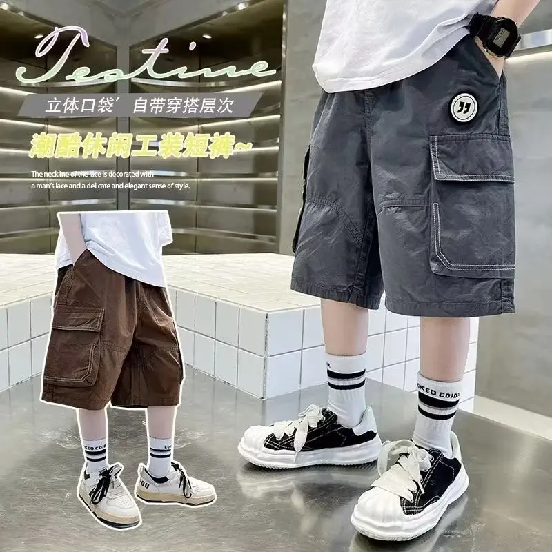 

Летние Шорты-карго для мальчиков Новинка 2023 модные красивые и модные повседневные пятиконечные брюки свободного покроя для детей среднего и старшего возраста