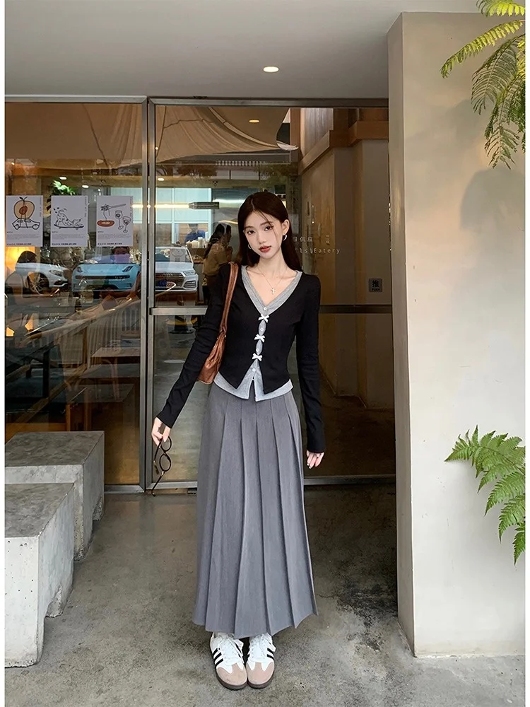 Искусственная двухсекционная короткая трикотажная рубашка с бантом женская