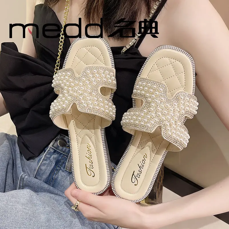 

The bottom of the jelly slippers pearl diamond summer new joker shoes with flat sole