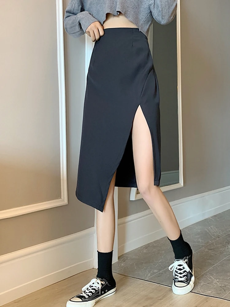 Откровенная открытая юбка новая ассиметричная черная с разрезом Женская