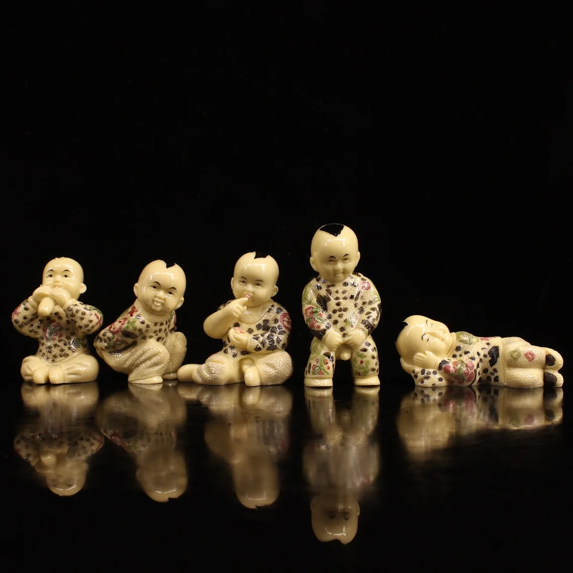 

Exquisite imitation pure hand-made lacquerware eating, drinking, Lhasa and sleeping boy ornaments
