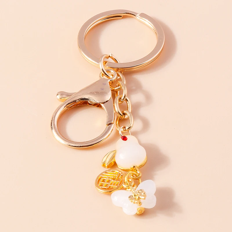 

Cute Animal Rabbit Keychains Opal Butterfly Charms Keyrings Souvenir Gifts for Women Men Handbag Pendants Key Chains Accessories