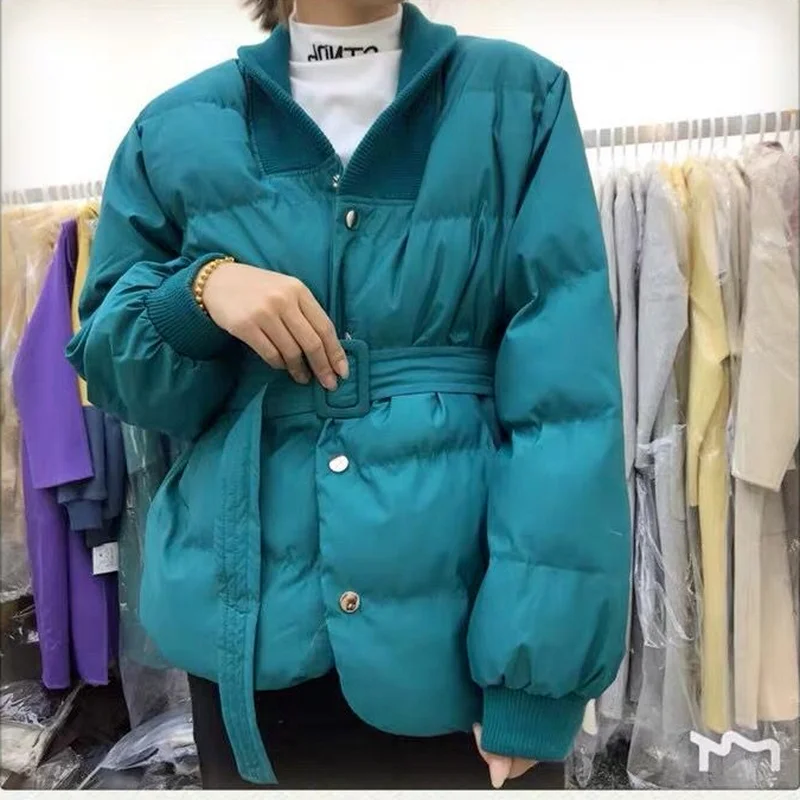 Fashionable Version of The V-neck Winter Waist Waist Waist Warmth Pure Color Wild Loose Belt Jacket Thickened Office Ladies