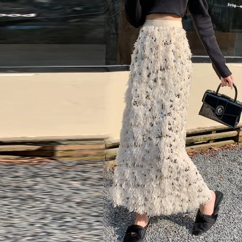 Женская длинная юбка с кисточками и пайетками