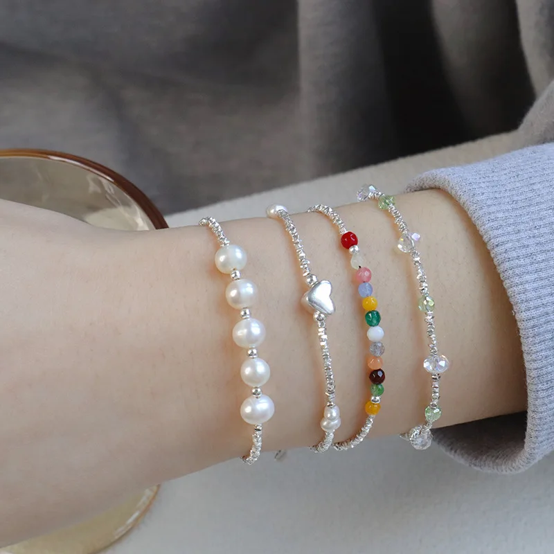 

Женские браслеты из серебра пробы с натуральным жемчугом